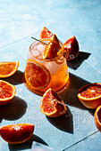 Aperol Spritz with blood orange and ice cubes