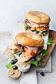 'Lone Start' bagel with grilled chicken and salmon