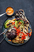 Grilled salad platter with romaine, chicory, radicchio and pointed peppers