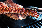Grill spare ribs on the plancha