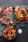 Grilled porterhouse steak with BBQ noodles
