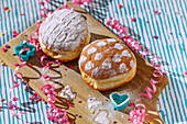 Carnival doughnuts with icing sugar decoration