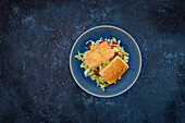 White cabbage salad with feta in a sesame crust