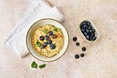 Three-grain porridge with blueberries
