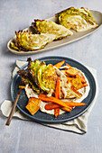 Oven vegetables and tofu on celery bean puree