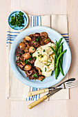 Boeuf Bourguignon - French braised dish with mashed potatoes and green beans