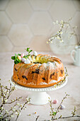 Easter bundt cake with marble pattern and spring decoration