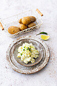 Indian potato salad with green chilli, lime and coconut yoghurt