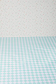 Turquoise and white chequered background, colourful dotted background