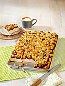 Yeast plum cake with almond crumbles