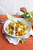Fine carrot gnocchi with mini mozzarella