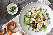 White sausage salad with radishes