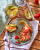 Quinoa salad with strawberries, pomelo and salmon and avocado terrine