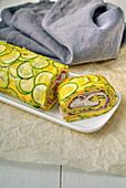 Courgette roulade with ham and caciotta