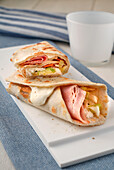 Piadina with bacon, stracchino and pecorino flakes