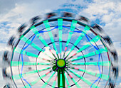 Motion blur of a Ferris wheel.