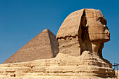 Africa, Egypt, Giza. Classic view of the Sphinx and one of the great Pyramids of Giza.
