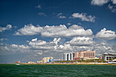USA, Florida, St. Petersburg. Hotels lining the intercoastal waterway against green and blue crystal clear water