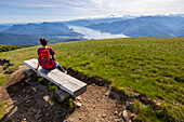 View of Lake Maggiore and piedmont mountains from the top of Monte Lema. Varese district, Lombardy, Italy.
