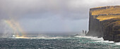 Panoramic view of Risin og Kellingin with rainbow viewed from Tjörnuvik, Eiði, Sunda municipality, Eysturoy, Faroe Islands, Denmark, Scandinavia