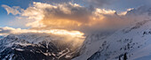 View of snow covered Aosta Valley and mountains from Pavillon du Mont Frety in winter, Courmayeur, Aosta Valley, Italian Alps, Italy