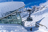View of snow covered Pavillon du Mont Frety and Skyway Monte Bianco cable car in winter, Courmayeur, Aosta Valley, Italian Alps, Italy