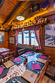 Interior view of typical wooden chalet cafe in Entreves in winter, Entreves, Aosta Valley, Italian Alps, Italy