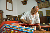 Wood painting workshop at Dar Sanaa, Arts and Crafts school, Tetouan, Rif mountains, Morocco