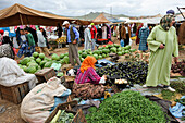 Displays of green beans, eggplants, onions and watermelons at the weekly Berber market, Khenifra province, Middle Atlas, Morocco