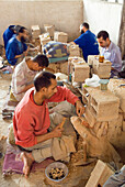 Workshop of cutting tiles for zelliges, Pottery district, Fes, Morocco