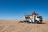 Truck stuck in the sand dunes of the Tibesti Mountains, Chad