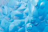 Glacial iceberg detail from ice calved off the Sawyer Glacier in Tracy Arm, Southeast Alaska, United States of America