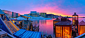 View of Opera House and harbourside saunas during winter at sunrise, Oslo, Norway, Scandinavia