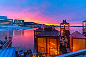 View of Opera House and harbourside saunas during winter at sunrise, Oslo, Norway, Scandinavia