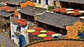 Chillies and corn being sun dried, Huangling, ancient village dating back to the Ming Dynasty, Wuyuan County, Shangrao City, Jiangxi Province, China