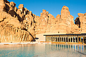 Swimming pool, surrounded by sandstone rock structures, Our Habitas AlUla, oasis in canyons of the Ashar Valley, Medina Province, Saudi Arabia