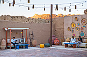 Open-air cafe on a small square in the old town of AlUla, Medina Province, Saudi Arabia