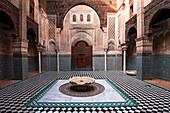 Beautiful interior and Islamic mosaic art, Al-Attarine Madrasa in the Medina of Fes, UNESCO, Morocco