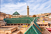 View from Al-Attarine Madrasa of green tiled roofs of Al-Karaouine, University of al-Qarawiyyin and Mosque, Medina of Fes, UNESCO, Morocco
