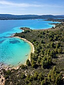 Diaporos island with wild beaches with turquoise water, drone aerial view, Chalkidiki, Greece