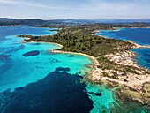 Diaporos island with wild beaches with turquoise water, drone aerial view, Chalkidiki, Greece