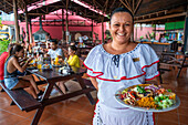 Local food casado dish in a local restaurant in La Fortuna village, Alajuela province, Costa Rica, Central America