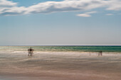 A serene long exposure coastal scene at Playa in Barbate, Andalusia, Spain.