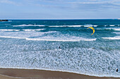 Aerial view of kite surfing on Praia da Cova da Alfarroba/Praia do Baia in Peniche