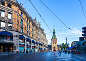 Oslo, Norway, Aug 10 2017, People bustle around Stortorvet Square, enjoying Oslo Cathedral and the vibrant urban landscape on a clear day.