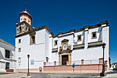 The Basilica of La Caridad, designed by Alonso de Vandelvira, stands in the Barrio Alto, showcasing early 17th-century architecture.
