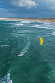 Aerial view of kite surfing on Praia da Cova da Alfarroba/Praia do Baia in Peniche