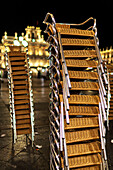 Piles of chairs at Plaza Mayor in Salamanca after closing time during nighttime