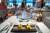 Restaurant inside SH Vega cruise is an expedition cruise ship operated by Swan Hellenic, Iceland.