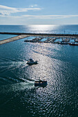 Aerial view of boats entering the Marina de Peniche sports port